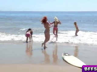 Hard up teens flirting with the adorable life guard end up sucking his prick